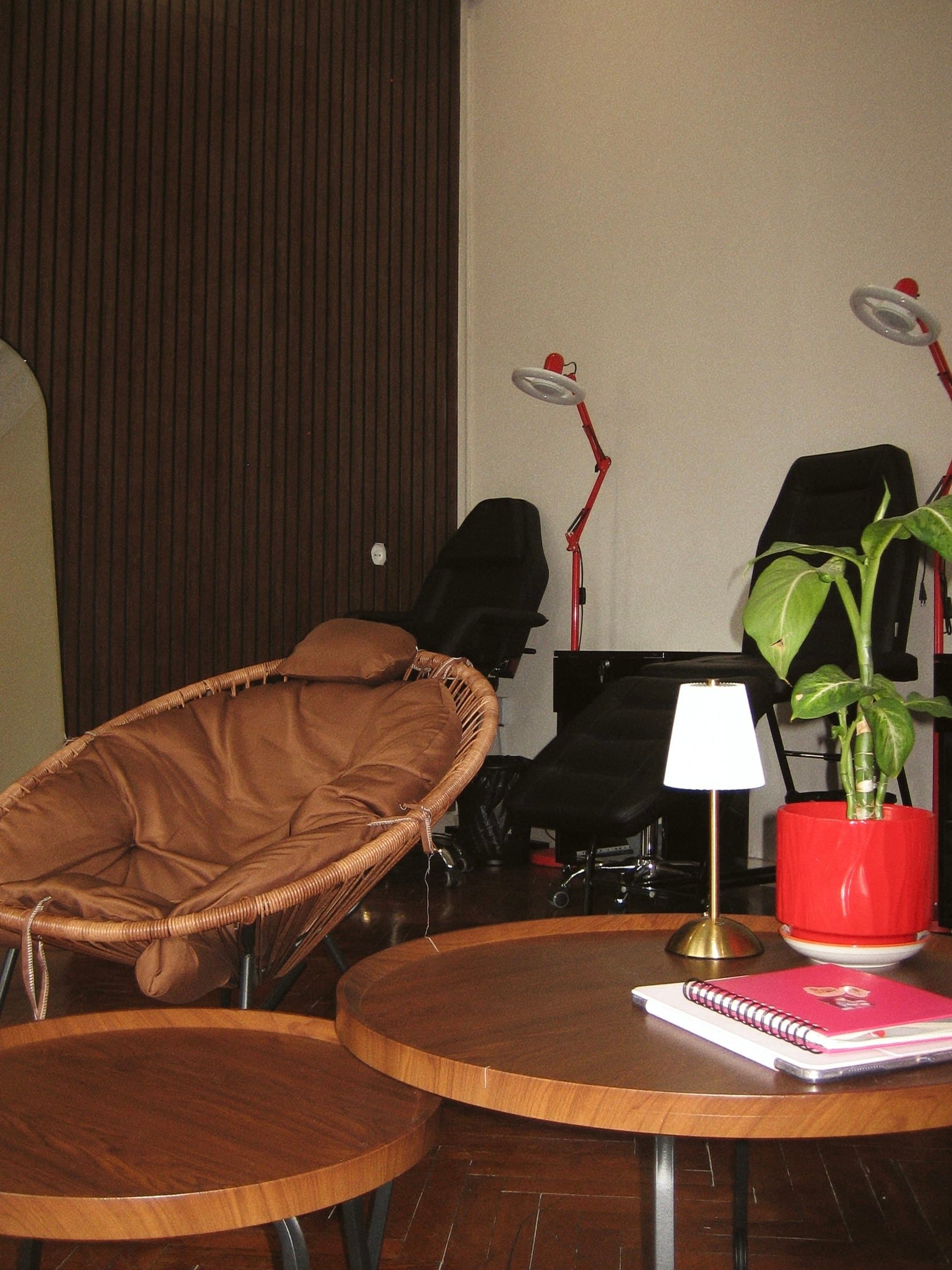 Tattoo workstations with professional chairs and lamps at LUX INK Batumi